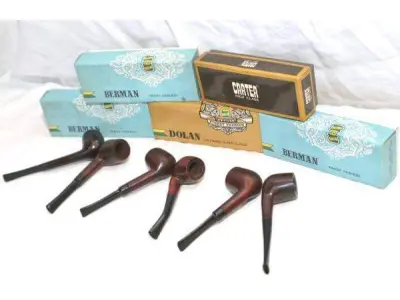 LOTE 277 - LOTE COM 6 RAROS CACHIMBOS SÉCULO XX. (JCI, CARTER) -  EM MADEIRA COM A PITEIRA EM BAQUELITE, À SABER: 4 (QUATRO) CACHIMBOS JCI (J. CARNEIRO & IRMÃOS),  EM EXCELENTE ESTADO DE CONSERVAÇÃO. (NO ESTADO)