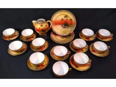 LOTE 179 - RARO JOGO PARA CHÁ JAPONÊS, PORCELANA CASCA DE OVO, ÓTIMA POLICROMIA E DOURAÇÃO,  CONSTANDO 1 LEITEIRA, 4 PRATOS PAR BOLO E 12 XÍCARAS (NO ESTADO)