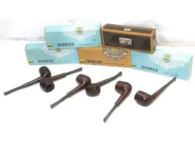 LOTE 277 - LOTE COM 6 RAROS CACHIMBOS SÉCULO XX. (JCI, CARTER) -  EM MADEIRA COM A PITEIRA EM BAQUELITE, À SABER: 4 (QUATRO) CACHIMBOS JCI (J. CARNEIRO & IRMÃOS),  EM EXCELENTE ESTADO DE CONSERVAÇÃO. (NO ESTADO)