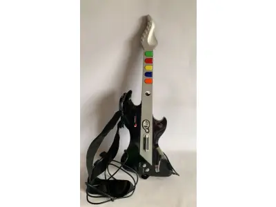 LOTE 535 - GUITARRA PLAYSTATION 2 USADA UMA VEZ E FOI GUARDADA ESTADO DE NOVO (NO ESTADO)