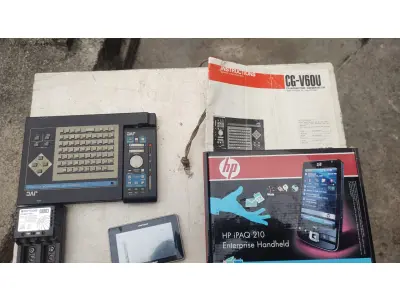 LOTE 431 - LOTE COM 1 HP IPAQ 210,1 GPS,1 CARREGADOR DE PILHAS E U1 EDITOR DE VÍDEO (NO ESTADO)