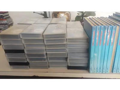 LOTE 639 - COLEÇÃO AVIÕES DE COMBATE COM.LIVROS E FITAS E COLEÇÃO COUSTEAU (NO ESTADO)