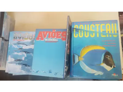 LOTE 639 - COLEÇÃO AVIÕES DE COMBATE COM.LIVROS E FITAS E COLEÇÃO COUSTEAU (NO ESTADO)