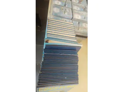 LOTE 639 - COLEÇÃO AVIÕES DE COMBATE COM.LIVROS E FITAS E COLEÇÃO COUSTEAU (NO ESTADO)