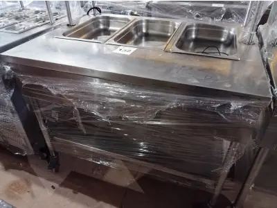 LOTE 132 - 01 BALCÃO INDUSTRIAL AQUECIDO COM PANELEIRO, 03 CUBAS E 02 PASSADORES, MEDINDO 120CMX90CM EM AÇO INOX. (NO ESTADO. LEILÃO NÃO TEM GARANTIA E NEM DEVOLUÇÃO).