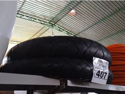 LOTE 407 - 02 PNEUS DE MOTO. (NO ESTADO) ATENÇÃO! FAZER A VISITAÇÃO ANTES DE ARREMATAR, NÃO SABEMOS SE FUNCIONA. LEILÃO NÃO TEM GARANTIA E NEM DEVOLUÇÃO, SUJEITO A POSSÍVEIS AVARIAS VISÍVEIS/OCULTAS E/OU AUSÊNCIA DE COMPONENTES.