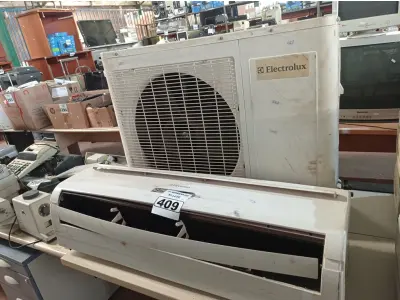 LOTE 409 - 01 AR-CONDICIONADO MARCA ELECTROLUX 18000BTU. (NO ESTADO) ATENÇÃO! FAZER A VISITAÇÃO ANTES DE ARREMATAR, NÃO SABEMOS SE FUNCIONA. LEILÃO NÃO TEM GARANTIA E NEM DEVOLUÇÃO, SUJEITO A POSSÍVEIS AVARIAS VISÍVEIS/OCULTAS E/OU AUSÊNCIA DE COMPONENTES.