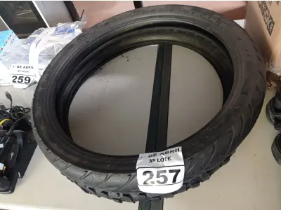 LOTE 257 - 02 PNEUS DE MOTO USADOS 90/90/21. (NO ESTADO) ATENÇÃO! FAZER A VISITAÇÃO ANTES DE ARREMATAR, NÃO SABEMOS SE FUNCIONA. LEILÃO NÃO TEM GARANTIA E NEM DEVOLUÇÃO, SUJEITO A POSSÍVEIS AVARIAS VISÍVEIS/OCULTAS E/OU AUSÊNCIA DE COMPONENTES.