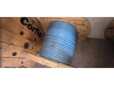 LOTE 110 - 01 CARRETEL COM CABO 150MM NA COR AZUL. (1KVA) COM 125 METROS (NO ESTADO) 