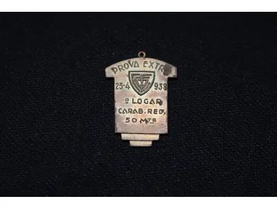 LOTE 009 - LOTE 9 – MEDALHAS PALESTRA ITÁLIA - ESPORTE 	MEDALHA	OBSERVAÇÕES 1.		Joquei Clube do Paraná – Festa da Terra. 1931	Acobreada - envelope da Coleção Júlio Estrella Moreira 2.		Joquei Clube do Paraná – Festa da Terra. 1931	Acobreada 3.		Joquei Clube do Paraná – Festa da Terra. 1931	Acobreada 4.		Joquei Clube do Paraná – Festa da Terra. 1931	Acobreada 5.		Joquei Clube do Paraná – Festa da Terra. 1931	Acobreada 6.		Joquei Clube do Paraná – Festa da Terra. 1931	Acobreada 7.		Graciosa Country Club – Campeonato de Tênis 1939. Gravador Mueller	Prateada - envelope da Coleção Júlio Estrella Moreira 8.		Graciosa Country Club – 1938. Gravador Mueller	Prateada - envelope da Coleção Júlio Estrella Moreira 9.		Graciosa Country Club – 1938. Gravador  J. Peón	Bronze - envelope da Coleção Júlio Estrella Moreira 10.		Graciosa Country Club – 1938. Gravador J. Peón	Bronze 11.		Sociedade de Tiro ao Alvo de Curitiba. 1940 Gravador: Mueller	Prateada - envelope da Coleção Júlio Estrella Moreira