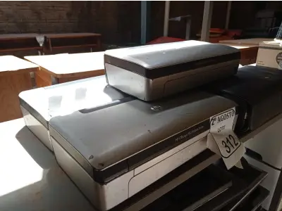 LOTE 312 - 05 SCANNERS DA MARCA HP. (NO ESTADO) ATENÇÃO! FAZER A VISITAÇÃO ANTES DE ARREMATAR, NÃO SABEMOS SE FUNCIONA. LEILÃO NÃO TEM GARANTIA E NEM DEVOLUÇÃO, SUJEITO A POSSÍVEIS AVARIAS VISÍVEIS/OCULTAS E/OU AUSÊNCIA DE COMPONENTES.