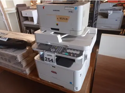 LOTE 254 - 02 IMPRESSORAS SENDO UMA MULTIFUNCIONAL OKI E A OUTRA SAMSUNG. (NO ESTADO) ATENÇÃO! FAZER A VISITAÇÃO ANTES DE ARREMATAR, NÃO SABEMOS SE FUNCIONA. LEILÃO NÃO TEM GARANTIA E NEM DEVOLUÇÃO, SUJEITO A POSSÍVEIS AVARIAS VISÍVEIS/OCULTAS E/OU AUSÊNCIA DE COMPONENTES.