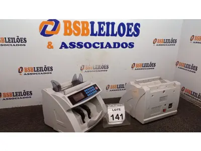 LOTE 141 - 02 MAQUINAS DE CONTAR CÉDULAS. (NO ESTADO) ATENÇÃO! FAZER A VISITAÇÃO ANTES DE ARREMATAR, NÃO SABEMOS SE FUNCIONA. LEILÃO NÃO TEM GARANTIA E NEM DEVOLUÇÃO, SUJEITO A POSSÍVEIS AVARIAS VISÍVEIS/OCULTAS E/OU AUSÊNCIA DE COMPONENTES.
