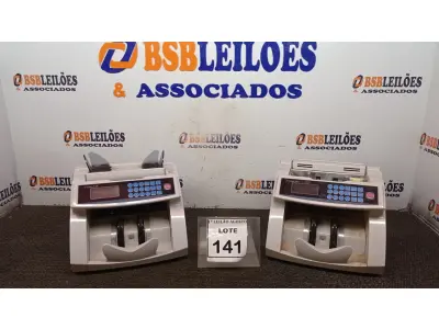 LOTE 141 - 02 MAQUINAS DE CONTAR CÉDULAS. (NO ESTADO) ATENÇÃO! FAZER A VISITAÇÃO ANTES DE ARREMATAR, NÃO SABEMOS SE FUNCIONA. LEILÃO NÃO TEM GARANTIA E NEM DEVOLUÇÃO, SUJEITO A POSSÍVEIS AVARIAS VISÍVEIS/OCULTAS E/OU AUSÊNCIA DE COMPONENTES.