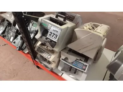 LOTE 273 - 07 MÁQUINAS DE CONTAGEM DE CÉDULAS. (NO ESTADO) ATENÇÃO! FAZER A VISITAÇÃO ANTES DE ARREMATAR, NÃO SABEMOS SE FUNCIONA. LEILÃO NÃO TEM GARANTIA E NEM DEVOLUÇÃO, SUJEITO A POSSÍVEIS AVARIAS VISÍVEIS/OCULTAS E/OU AUSÊNCIA DE COMPONENTES.