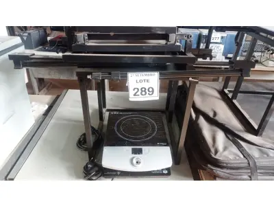 LOTE 289 - 02 FOGÕES DE INDUÇÃO. (NO ESTADO) ATENÇÃO! FAZER A VISITAÇÃO ANTES DE ARREMATAR, NÃO SABEMOS SE FUNCIONA, LEILÃO NÃO TEM GARANTIA E NEM DEVOLUÇÃO, SUJEITO A POSSÍVEIS AVARIAS VISÍVEIS/OCULTAS E/OU AUSÊNCIA DE COMPONENTES.