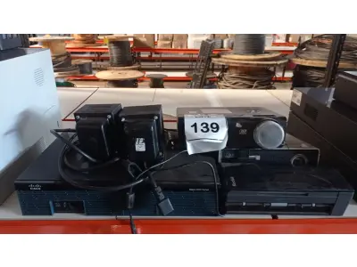 LOTE 139 - 01 SCANNER MODELO I940 MARCA KODAK, 02 PROJETORES MARCA LG, 01 ROTEADOR CISCO 2900 SERIES E 02 TRANSFORMADORES. (NO ESTADO) ATENÇÃO! FAZER A VISITAÇÃO ANTES DE ARREMATAR, NÃO SABEMOS SE FUNCIONA, LEILÃO NÃO TEM GARANTIA E NEM DEVOLUÇÃO, SUJEITO A POSSÍVEIS AVARIAS VISÍVEIS/OCULTAS E/OU AUSÊNCIA DE COMPONENTES.