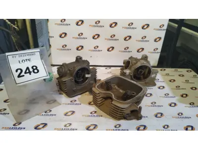 LOTE 248 - 03 CABEÇOTES DE MOTO YAMAHA. (NO ESTADO) ATENÇÃO! FAZER A VISITAÇÃO ANTES DE ARREMATAR, NÃO SABEMOS SE FUNCIONA, LEILÃO NÃO TEM GARANTIA E NEM DEVOLUÇÃO, SUJEITO A POSSÍVEIS AVARIAS VISÍVEIS/OCULTAS E/OU AUSÊNCIA DE COMPONENTES.