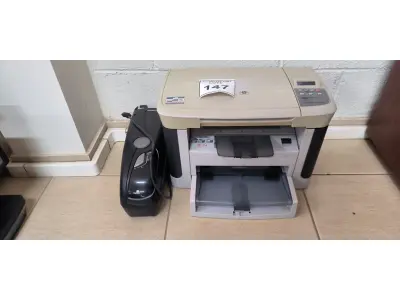 LOTE 147 - 01 IMPRESSORA HP LASERJET M1120MFP E 01 ESTABILIZADOR RAGTECH. (NO ESTADO) ATENÇÃO! FAZER A VISITAÇÃO ANTES DE ARREMATAR, NÃO SABEMOS SE FUNCIONA, LEILÃO NÃO TEM GARANTIA E NEM DEVOLUÇÃO, SUJEITO A POSSÍVEIS AVARIAS VISÍVEIS/OCULTAS E/OU AUSÊNCIA DE COMPONENTES.