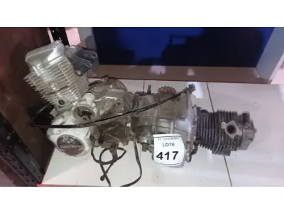 LOTE 417 - 02 MOTORES DE MOTO. (NO ESTADO) ATENÇÃO! FAZER A VISITAÇÃO ANTES DE ARREMATAR, NÃO SABEMOS SE FUNCIONA, LEILÃO NÃO TEM GARANTIA E NEM DEVOLUÇÃO, SUJEITO A POSSÍVEIS AVARIAS VISÍVEIS/OCULTAS E/OU AUSÊNCIA DE COMPONENTES.