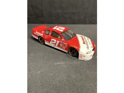LOTE 144 - 01 RARA MINIATURA DA CASCAR ACTION NASCAR 1/24 DIECAST #21 MIKE DILLON ROCKWELL AUTOMATION 2000 MONTE CARLO,COMPRADA EM GARAGEM DE ANTIGUIDADES NOS EUA. (NO ESTADO) ATENÇÃO! FAZER A VISITAÇÃO ANTES DE ARREMATAR, NÃO SABEMOS SE FUNCIONA, LEILÃO NÃO TEM GARANTIA E NEM DEVOLUÇÃO, SUJEITO A POSSÍVEIS AVARIAS VISÍVEIS/OCULTAS E/OU AUSÊNCIA DE COMPONENTES.