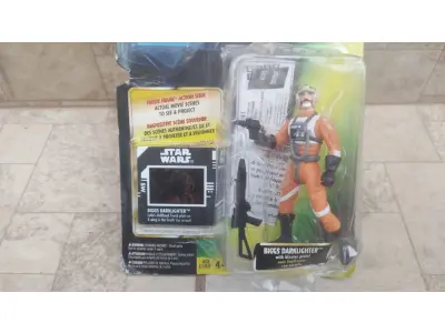LOTE 164 - 01 FIGURA DE AÇÃO STAR WARS BIGGS DARKLIGHTER 1997 POWER OF THE FORCE FREEZE FRAME,NOVA NA EMBALGEM, ITEM COMPRADO EM GARAGENS DE ANTIGUIDADES NOS EUA. (NO ESTADO) ATENÇÃO! FAZER A VISITAÇÃO ANTES DE ARREMATAR, NÃO SABEMOS SE FUNCIONA, LEILÃO NÃO TEM GARANTIA E NEM DEVOLUÇÃO, SUJEITO A POSSÍVEIS AVARIAS VISÍVEIS/OCULTAS E/OU AUSÊNCIA DE COMPONENTES.