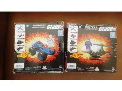 LOTE 134 - 01 LOTE COM DOIS GI JOE COBRA COBRA FANG COM 47 PEÇAS DA HASBRO. GIJOE CONSTRUCTION SET - COBRA FERRET NOVOS NA CAIXA SEM USO, ITEM COMPRADO EM GAREGEM DE ANTIGUIDADES NOS EUA. ITEM DE COLEÇÃO. (NO ESTADO) ATENÇÃO! FAZER A VISITAÇÃO ANTES DE ARREMATAR, NÃO SABEMOS SE FUNCIONA, LEILÃO NÃO TEM GARANTIA E NEM DEVOLUÇÃO, SUJEITO A POSSÍVEIS AVARIAS VISÍVEIS/OCULTAS E/OU AUSÊNCIA DE COMPONENTES.