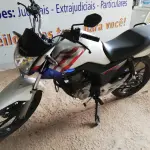 LOTE 403 - 01 MOTO HONDA CG 160 FAN FLEX; ANO 2018/2018 NA COR BRANCA. (NO ESTADO, NÃO SABEMOS SE FUNCIONA. LEILÃO NÃO TEM GARANTIA E NEM DEVOLUÇÃO.)