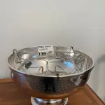 LOTE 036 - 01 CHAMPANHEIRA REDONDA, EM PRATA COM SUPORTE PARA 03 GARRAFAS. (NO ESTADO DE CONSERVAÇÃO QUE SE ENCONTRA) 