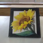 LOTE 015 - 02 (DOIS) QUADROS PINTURA DE “BAIANA”, 01 (UM) MINI QUADRO DE GIRASSOL E 01 QUADRO PARA FUTEBOL DE BOTÃO MARCA XALINGÃ.(NO ESTADO)
