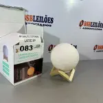 LOTE 083 - 01 LUMINARIA UMIDIFICADORA FORMATO LUA (NO ESTADO, NÃO SABEMOS SE FUNCIONA. LEILÃO NÃO TEM GARANTIA E NEM DEVOLUÇÃO)