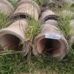 LOTE 087 - 14 MANILHAS DE CONCRETO DE 90CM (NO ESTADO, NÃO SABEMOS SE FUNCIONA. LEILÃO NÃO TEM GARANTIA E NEM DEVOLUÇÃO).