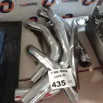 LOTE 435 - 01 LOTE COM VÁRIAS CAPAS PROTETORAS DE ESCAPAMENTO MODELOS DIVERSOS. (NO ESTADO, LEILÃO NÃO TEM GARANTIA E NEM DEVOLUÇÃO, SUJEITO A POSSÍVEIS AVARIAS VISÍVEIS/OCULTAS E/OU AUSÊNCIA DE COMPONENTES).