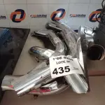 LOTE 435 - 01 LOTE COM VÁRIAS CAPAS PROTETORAS DE ESCAPAMENTO MODELOS DIVERSOS. (NO ESTADO, LEILÃO NÃO TEM GARANTIA E NEM DEVOLUÇÃO, SUJEITO A POSSÍVEIS AVARIAS VISÍVEIS/OCULTAS E/OU AUSÊNCIA DE COMPONENTES).
