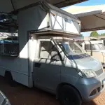 LOTE 473 - 01 CAMINHONETE I/RELY PICK-UP A GASOLINA NA COR PRATA; ANO 2013/2014.  CONSTA DÉBITO DE R$1319,24. (NO ESTADO)
