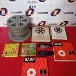LOTE 077 - 01 LOTE COM ROLO DE FILME PARA PROJETOR ANTIGO (NO ESTADO, NÃO SABEMOS SE FUNCIONA. LEILÃO NÃO TEM GARANTIA E NEM DEVOLUÇÃO).