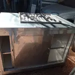 LOTE 512 - 01 BALCÃO EM INOX COM 02 PORTAS DE CORRER. (NO ESTADO, LEILÃO NÃO TEM GARANTIA E NEM DEVOLUÇÃO, SUJEITO A POSSÍVEIS AVARIAS VISÍVEIS/OCULTAS E/OU AUSÊNCIA DE COMPONENTES).