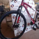 LOTE 300 - 01 BICICLETA ARO 29, COR VERMELHO COM PRETO, NANO 24V SKY TRAZ 24 MARCHAS COM SISTEMA CASSETE MICROSHIFT E FREIOS HIDRÁULICOS. QUADRO SKY EM ALUMÍNIO 6061 NANO; SUSPENSÃO HEILAND AHEADSET 100MM;ALAVANCA MICROSHIFT  3 X 8 VELOCIDADES; PEDIVELA SHIFT TECH 42/32/22; MOVIMENTO CENTRAL ROLAMENTADO; CÂMBIO DIANTEIRO MICROSHIFT 3V  7/8 X 3V 42/32/22 ;CAMBIO TRASEIRO MICROSHIFT 8V COM CAGE LONGO RDM26L;CASSETE MICROSHIFT 8 VELOCIDADES COM RELAÇÃO 11-34 DENTES; CORRENTE YBN INDEX 1/2 X 3/32 116L; CUBOS SHIFT TECH CASSETTE COM BLOCAGENS 36 FUROS; DISCOS 160MM;FREIO A DISCO ALHONGA LANCER PAVOLUTION; GUIDÃO HEILAND EM ALUMÍNIO 31.8MM; SUPORTE DE GUIDÃO HEILAND ALUMÍNIO 31.8MM; PNEUS SWALLOW 29 X 2.10; SELIM SKY MTB; CANOTE DE SELIM HEILAND 27.2MM; AROS DUPLOS WLK 29 36 FUROS; PEDAL PLATAFORMA HEILAND NYLON.(NOVA) (NO ESTADO)