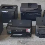 LOTE 064 - 08 IMPRESSORAS DE JATO DE TINTA E LASER MULTIFUNCIONAIS (MARCAS: EPSON E HP)  (UNIDADE: B-017 - SANTA MARIA/RS - LOCAL DE RETIRADA: RUA CIDADE DE TREINTA Y TRÊS, Nº 59, BAIRRO NOSSA SENHORA DE LOURDES - SANTA MARIA/RS  - CEP: 97.060 -640)