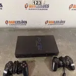 LOTE 123 - 01 PS2 FAT. (NO ESTADO) ATENÇÃO! FAZER A VISITAÇÃO ANTES DE ARREMATAR, NÃO SABEMOS SE FUNCIONA. LEILÃO NÃO TEM GARANTIA E NEM DEVOLUÇÃO, SUJEITO A POSSÍVEIS AVARIAS VISÍVEIS/OCULTAS E/OU AUSÊNCIA DE COMPONENTES.