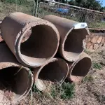 LOTE 108 - 05 MANILHA EM CONCRETO 1METO X70CM (NO ESTADO)