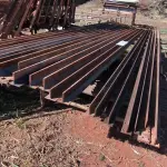 LOTE 102 - 20 BARRAS EM FERRO T APX 5 METROS (NO ESTADO)