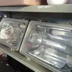 LOTE 187 - 02 LUMINÁRIAS DE PÁTIO E 02 REATORES PARA LÂMPADA VAPOR METÁLICO 150W. (NO ESTADO) ATENÇÃO! FAZER A VISITAÇÃO ANTES DE ARREMATAR, NÃO SABEMOS SE FUNCIONA. LEILÃO NÃO TEM GARANTIA E NEM DEVOLUÇÃO, SUJEITO A POSSÍVEIS AVARIAS VISÍVEIS/OCULTAS E/OU AUSÊNCIA DE COMPONENTES.