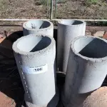 LOTE 106 - 04 MANILHAS EM CONCRETO DE 1 METRO X 40CM (NO ESTADO)