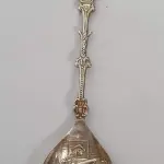 LOTE 101 - RARA COLHER IMPORTADA PRATA 90, (NO ESTADO)