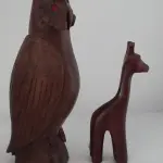 LOTE 174 - ESCULTURAS EM MADEIRA NOBRE,MAIS ESCULTURA RARA TOURO EM JACARANDÁ (COM AVARIAS) (NO ESTADO)