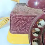LOTE 340 - ANTIGO TELEFONE DE MESA ITALIANO, DÉCADA DE 30,  EM METAL ESMALTADO, COM GUARNIÇÕES EM RESINA,  24X28 CM. (NO ESTADO)