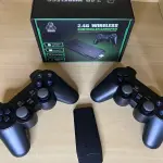 LOTE 027 - 01 VIDEOGAME STICKER COM 2 CONTROLES E CENTENAS DE JOGOS EMBUTIDOS(NO ESTADO)