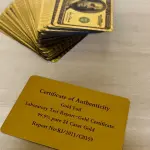 LOTE 010 - 01 BARALHO DOURADO ESPELHADO DOLLAR GOLD(NO ESTADO)