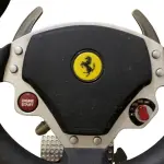 LOTE 309 - VOLANTE FERRARI WIRELESS GT COCKPIT 430 SCUDERIA USADO A TEMPOS FOI GUARDADO NUNCA MAIS USADO (NO ESTADO)